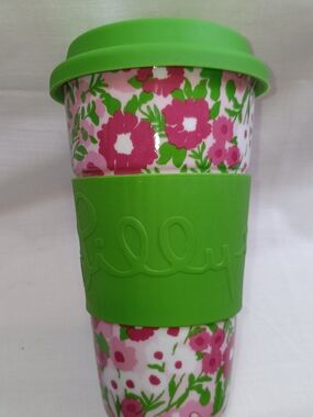 Lilly Pulitzer Pink Floral Ceramic Travel Mug with Green Silicone Lid.